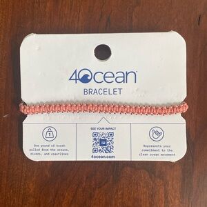 4Ocean bracelet. Funds a global ovean cleanup operation. New on Card